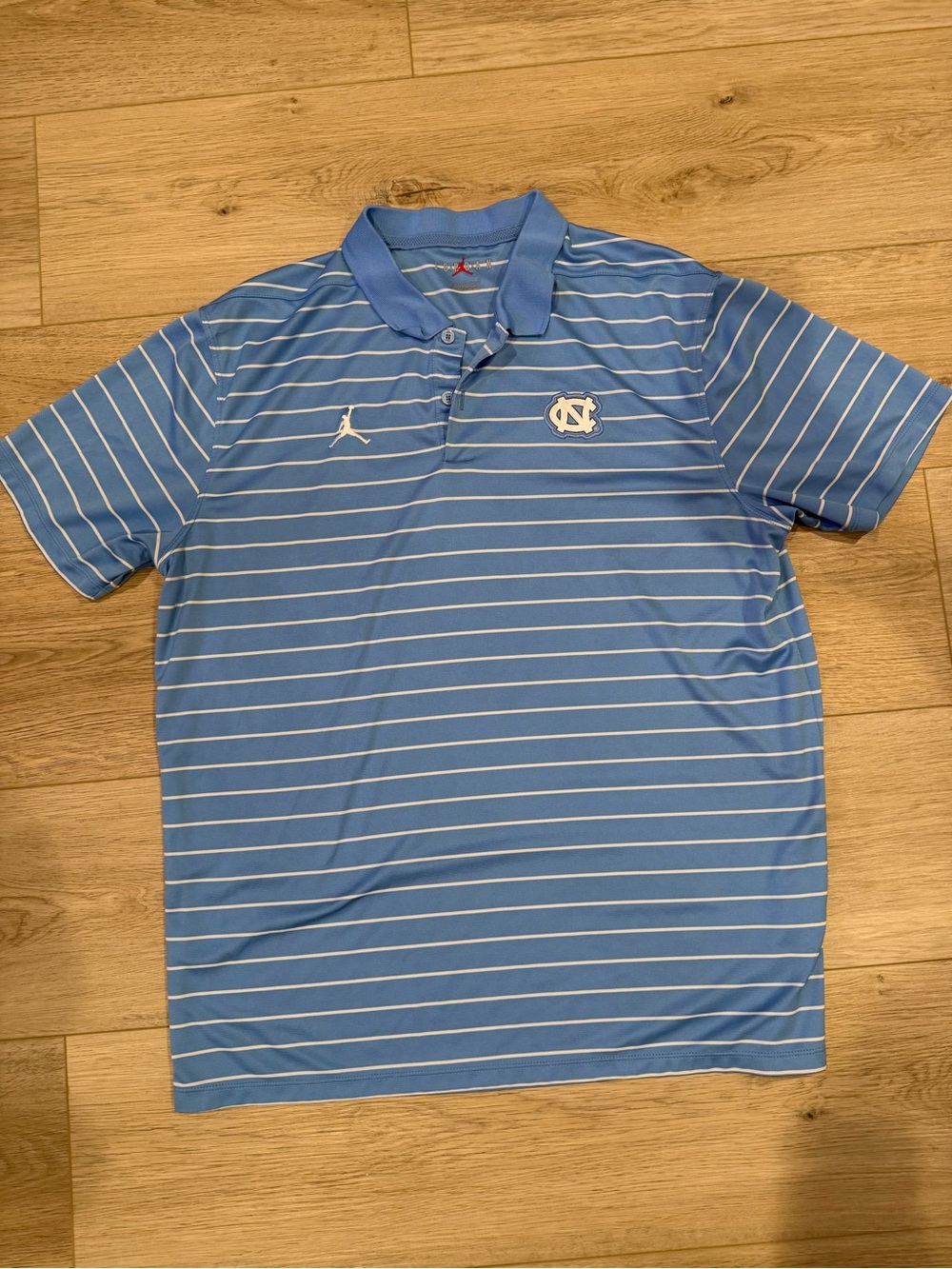 Jordan Men's Carolina Blue Striped Polo with Jumpman and UNC Logo
